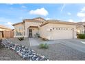 Charming single-story home featuring a low-maintenance desert landscape and a two-car garage at 2537 E Vista Bonita Dr, Phoenix, AZ 85024