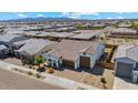Beautiful home in a well maintained neighborhood featuring desert landscaping and mountain views in the distance at 25800 N 140Th Ln, Surprise, AZ 85387