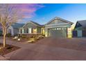Well-lit, single-story home with a two car garage and a meticulously landscaped yard at 2617 S Jeffry St, Gilbert, AZ 85295