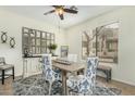Bright dining room featuring stylish decor and ample natural light, perfect for intimate meals at 7445 E Eagle Crest Dr # 1122, Mesa, AZ 85207