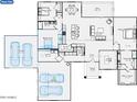 Detailed floor plan showcasing the layout, including the kitchen, bedrooms, garages, and outdoor patio at 9430 W Sandstone Mountain Dr, Casa Grande, AZ 85194