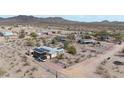 Expansive aerial view of property highlighting desert landscape and solar panels at 31918 N 163Rd Ave, Surprise, AZ 85387
