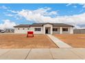A single Gathering home with neutral color scheme sits on a sunny lot at 6515 N Loma Ct, Casa Grande, AZ 85194