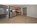 Kitchen with stainless steel appliances, granite countertops, and tiled floor at 352 E Beatryce St, Tempe, AZ 85288