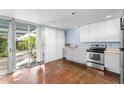 Bright, galley-style kitchen featuring stainless steel appliances and easy access to the outside at 4225 N 36Th St # 24, Phoenix, AZ 85018