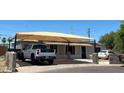 Inviting home with a spacious carport, providing ample covered parking and shade at 4426 N 34Th Dr, Phoenix, AZ 85017