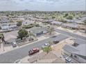 Wide aerial view of neighborhood highlighting the location of the charming single-story house at 15243 N 52Nd Dr, Glendale, AZ 85306