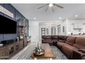 Inviting living room with a board and batten accent wall and comfortable seating at 3522 E Penedes Dr, Gilbert, AZ 85298