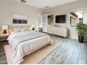 Serene main bedroom featuring a comfortable bed, stylish decor, and a bright window view at 4171 E Ronald St, Gilbert, AZ 85295