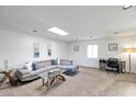 Cozy living room with neutral tones features a skylight and comfortable seating at 6240 N 16Th St # 45, Phoenix, AZ 85016