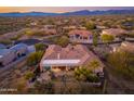 Expansive desert estate with mountain views, featuring a backyard patio area, offering a serene and private retreat at 8427 E Preserve Way, Scottsdale, AZ 85266
