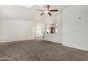 Spacious living room with neutral carpet and plenty of natural light at 2929 E Sequoia Dr, Phoenix, AZ 85050