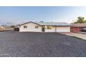 A cozy one-story home with a well-kept front yard and a driveway at 1718 S Marilyn Ann Dr, Tempe, AZ 85281