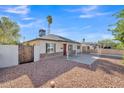 Quaint single-story home features a red front door and a xeriscaped front yard for low maintenance at 4617 N 8Th Pl, Phoenix, AZ 85014