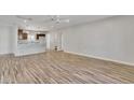 Spacious living room showcasing wood-look tile floors and abundant natural light at 4617 N 8Th Pl, Phoenix, AZ 85014