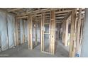 Framing and insulation in an unfinished new home with pre-wiring throughout at 32155 N Lone Rancher Way, San Tan Valley, AZ 85140