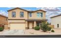 Inviting two-story home with a well-maintained front yard and a two-car garage at 45108 W Zion Rd, Maricopa, AZ 85139