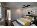 Bedroom with fan, closet, neutral colored walls and decor at 5103 S Birch St, Tempe, AZ 85282