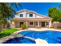 Backyard pool and spa offer a refreshing oasis for relaxation and entertainment at 5752 S Crossbow Pl, Chandler, AZ 85249