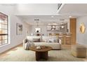 Open-concept living space with a view of the kitchen and dining area at 8845 S 48Th St # 1, Phoenix, AZ 85044