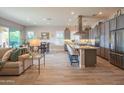 Spacious open floorplan with modern kitchen, dining area, and inviting living room at 13189 W Caleb Rd, Peoria, AZ 85383