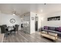 Open-concept living and dining area with modern finishes and plenty of natural light at 12123 W Bell Rd # 339, Surprise, AZ 85378