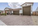 Charming home with a large driveway and three-car garage, perfect for a growing Gathering at 13941 W Tierra Grande --, Surprise, AZ 85387
