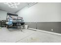 Spacious three-car garage with epoxy flooring at 13941 W Tierra Grande --, Surprise, AZ 85387