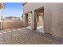 Covered patio featuring classic brick pavers, ideal for outdoor dining and relaxing in style at 2894 E Nolan Pl, Chandler, AZ 85249