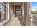 Inviting covered porch with arched columns, offering a shaded entry and enhanced curb appeal at 2894 E Nolan Pl, Chandler, AZ 85249