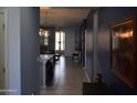 Stylish hallway with tile flooring leading to an open-concept living area at 429 N San Ricardo N Trl, Casa Grande, AZ 85194