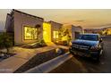 Attractive single-story home with desert landscaping and a paved walkway at twilight at 21 W Beryl Ave, Phoenix, AZ 85021