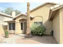 Attractive home entrance with desert landscaping, a secure door, and a walkway leading to the front door at 1132 E Harbor View Dr, Gilbert, AZ 85234