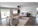 Bright living room with neutral tones, modern furnishings, and plenty of natural light at 17635 N 22Nd St, Phoenix, AZ 85022
