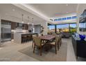 Open concept living with dining area and mountain views at 37200 N Cave Creek Rd # 2108, Scottsdale, AZ 85262