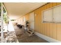 Relaxing covered porch with ample seating, providing a cozy outdoor living space at 1524 E 23Rd Ave, Apache Junction, AZ 85119