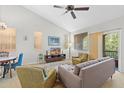 Inviting living room with comfortable seating, a ceiling fan, neutral tones, and ample natural light at 1920 E Bell Rd # 1034, Phoenix, AZ 85022