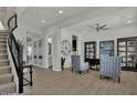 Spacious living room has tile floors, neutral paint and lots of natural light at 2541 E Presidio St, Mesa, AZ 85213