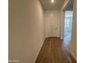Bright entryway featuring wood-look tile flooring and a neutral color palette, perfect for any decor at 15790 W Cheryl Dr, Waddell, AZ 85355