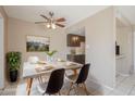 Charming dining area showcasing a modern table setting, stylish decor, and bright natural light at 4614 E Pueblo Ave, Phoenix, AZ 85040