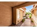 A close view of the walkway leading to this townhouse's front door and well kept landscape at 1633 E Lakeside Dr # 25, Gilbert, AZ 85234