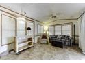 Inviting living room features a comfortable seating area, warm lighting, and a cozy atmosphere perfect for relaxation at 17200 W Bell Rd # 652, Surprise, AZ 85374