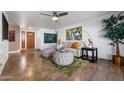 Bright and airy living room showcasing stylish decor, comfortable seating, and natural light at 2218 W Curry St, Chandler, AZ 85224