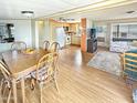 Open floor plan with a dining area and a view into the living room and kitchen at 25 S 102Nd St # 73, Mesa, AZ 85208