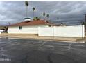 Exterior home view with a white brick perimeter wall for added privacy at 4701 N 39Th Dr, Phoenix, AZ 85019
