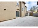 Spacious concrete backyard, offering a low-maintenance outdoor space at 9435 S 33Rd Dr, Laveen, AZ 85339