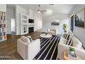 Bright living room features vaulted ceiling, fireplace, and stylish furnishings at 1488 W Page Ave, Gilbert, AZ 85233