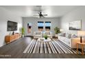 Bright living room with modern furniture, stylish rug, and plenty of natural light at 2367 E Rosario Mission Dr, Casa Grande, AZ 85194