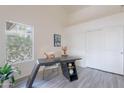 Bright office space features a modern desk, large window, and closet at 255 S Kyrene Rd # 212, Chandler, AZ 85226