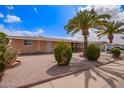 Inviting single-story home showcasing desert landscaping, mature trees, and a 'Coming Soon' sign at 5445 E Dallas St, Mesa, AZ 85205
